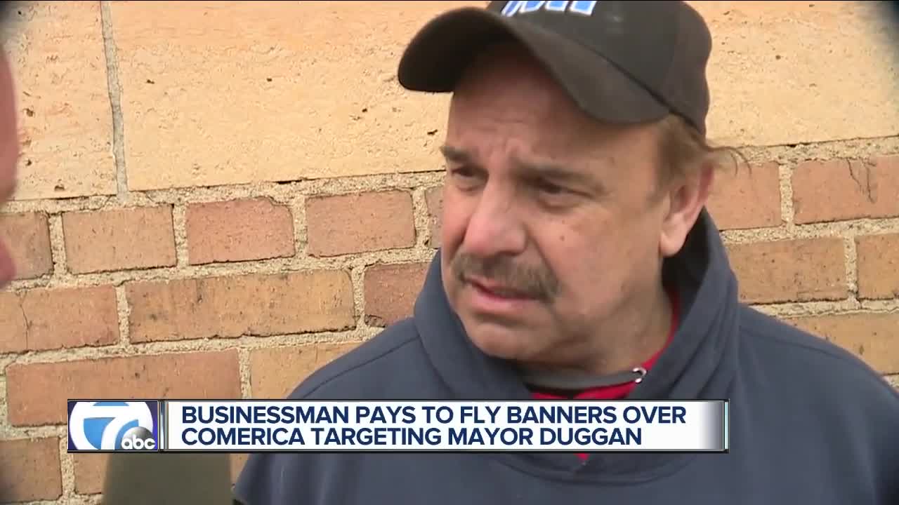 Duggan foe Bob Carmack flies banners on Detroit Tigers Opening Day criticizing mayor