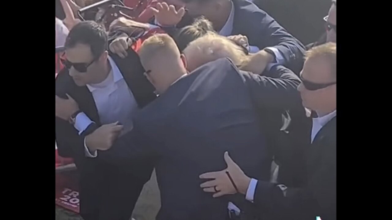 New footage of Secret Service using Trump to the car