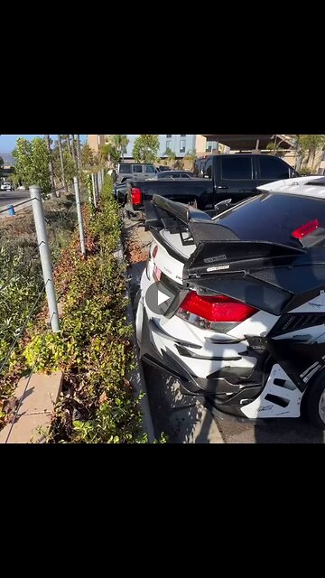 This car goes very fast because it’s covered in carbon fiber fins for aerodynamics. It’s science.
