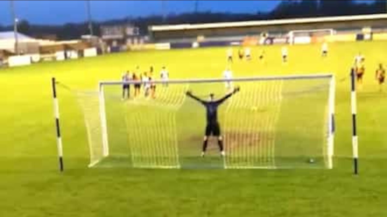 Badly taken penalty destroys football stadium light