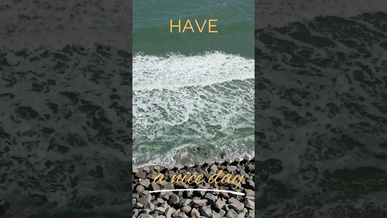 😊Have a Nice Day! Aerial Majesty: Waves vs. Seawall