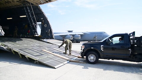 Dover AFB loadmasters conduct service tail training b-roll stringer