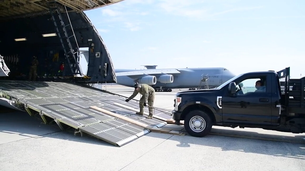 Dover AFB loadmasters conduct service tail training b-roll stringer