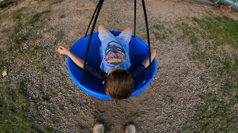 Just a 4yr old getting dizzy on a swing