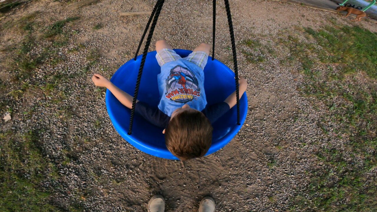 Just a 4yr old getting dizzy on a swing