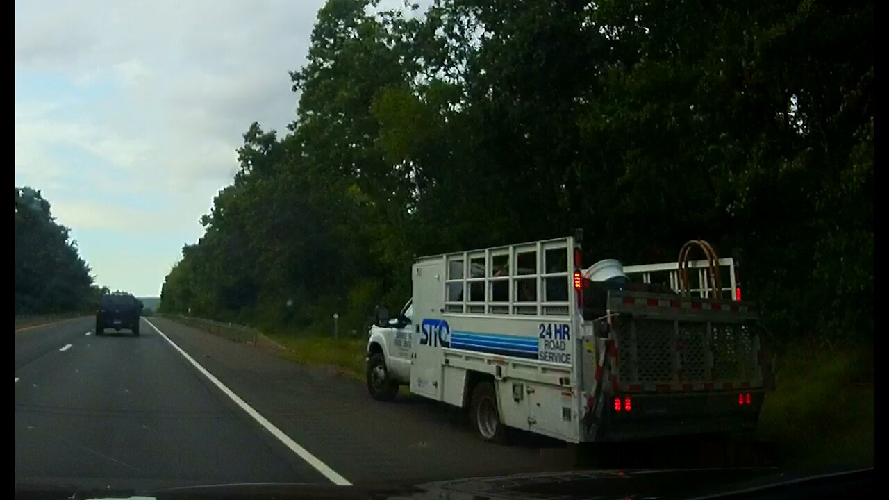 Highway Road Service Truck has flat tire dashcam video