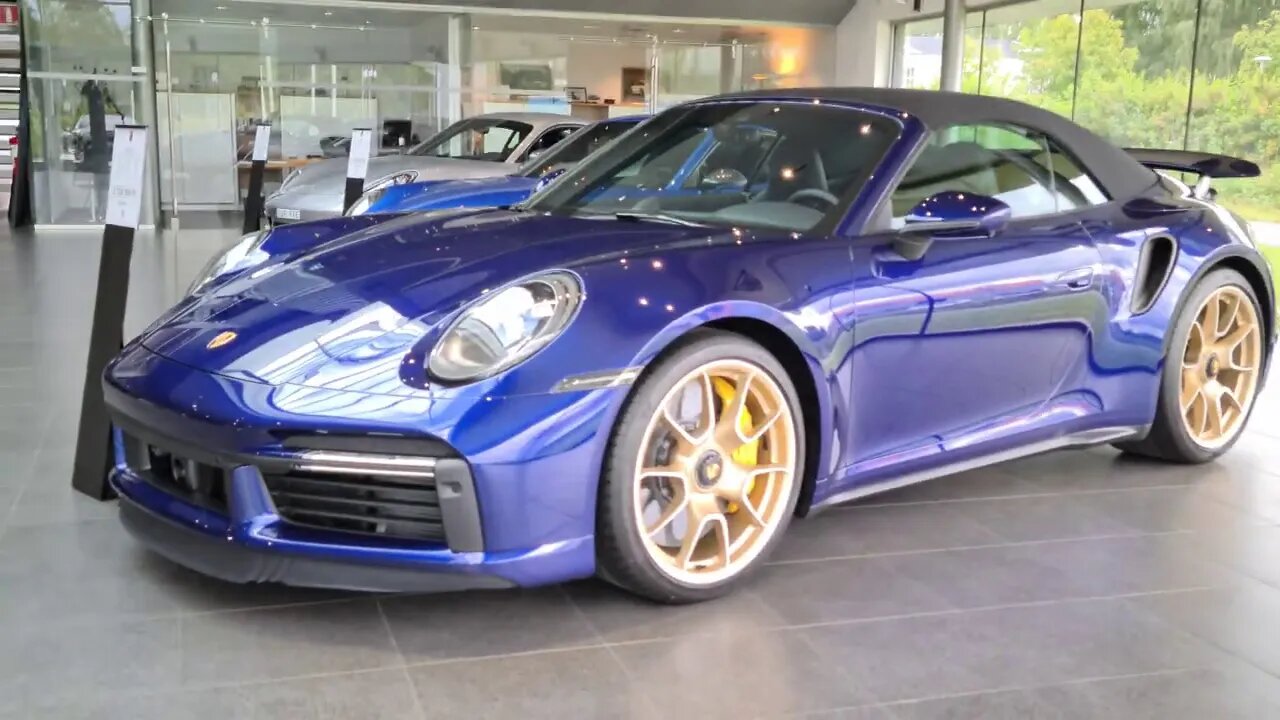 [8k] Gentian Blue Porsche 992 Turbo S Convertible at Porsche Center Borås Sweden