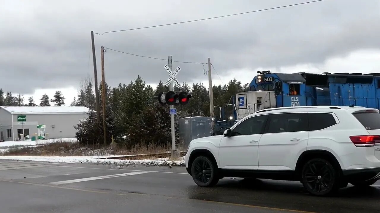 Dragging A Branch Across The Highway Is Better Than A Log! #trains #trainvideo | Jason Asselin