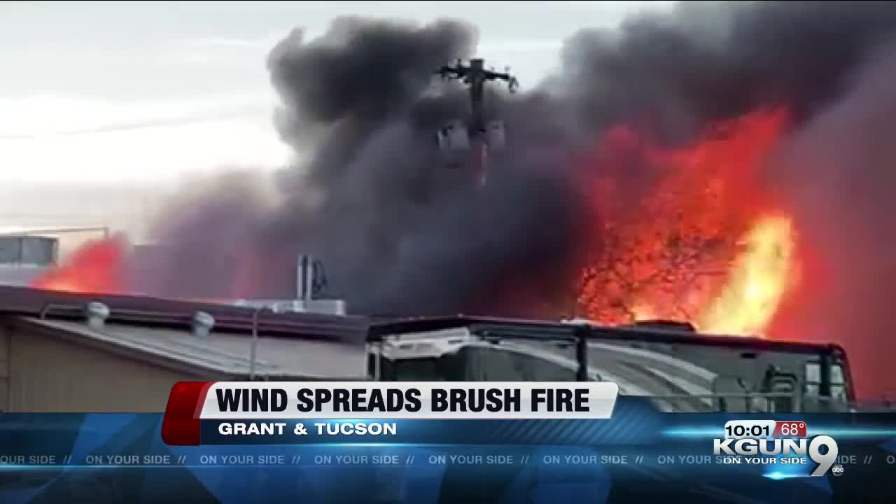 Fire threatening building near Grant Road and Stone Avenue