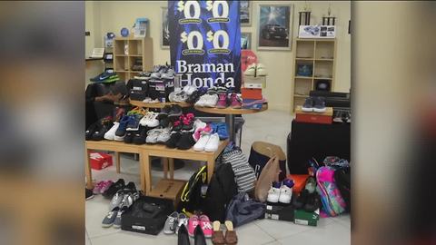 Braman Honda collects shoes and backpacks for kids