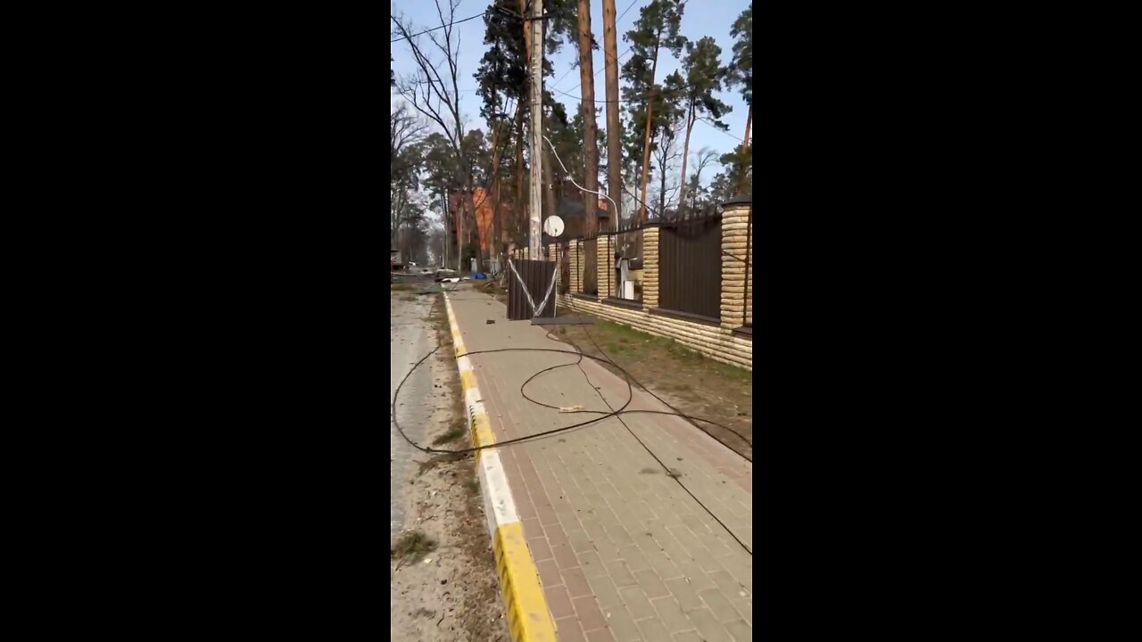 Ukrainian forces walk through devastated neighborhoods in Irpin Ukraine