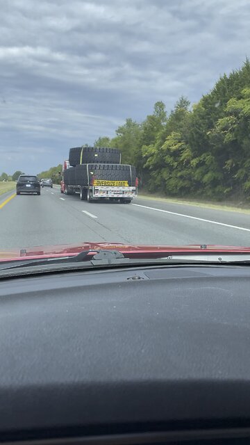 Tires so big you need a wide load banner to transport them