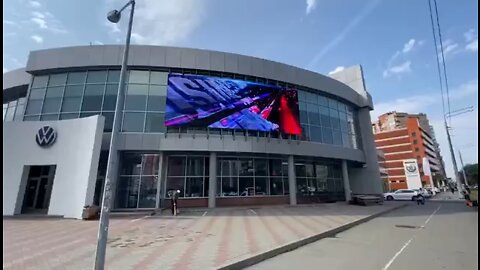 Transparent video billboards on Building FACADE.