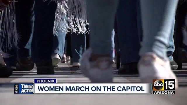 Women march on the capitol in Phoenix