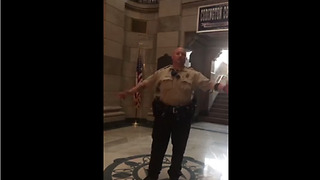 Off-Duty Deputy Sings National Anthem In An Empty Courthouse