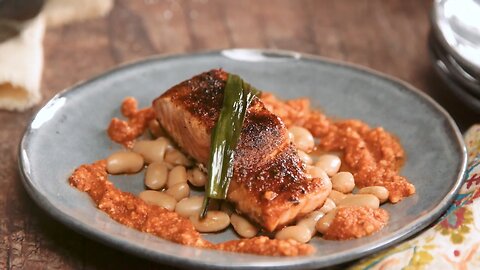 Pan Seared Catalan Romesco Verlasso Salmon - Thyme Cannellini Beans & Charred Green Onions