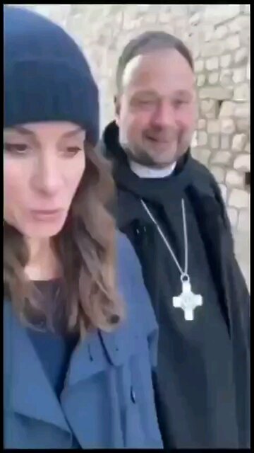 Christian clergyman just minding his own business when Jews decide to spit on him