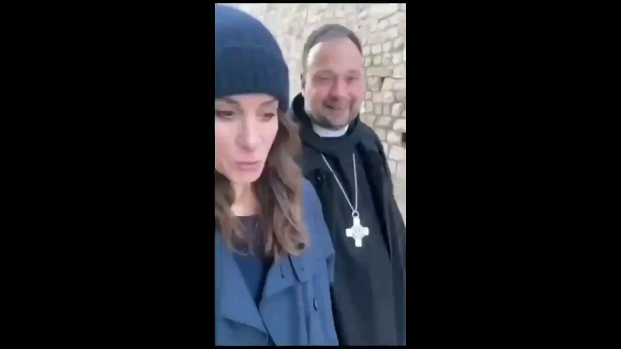 Christian clergyman just minding his own business when Jews decide to spit on him