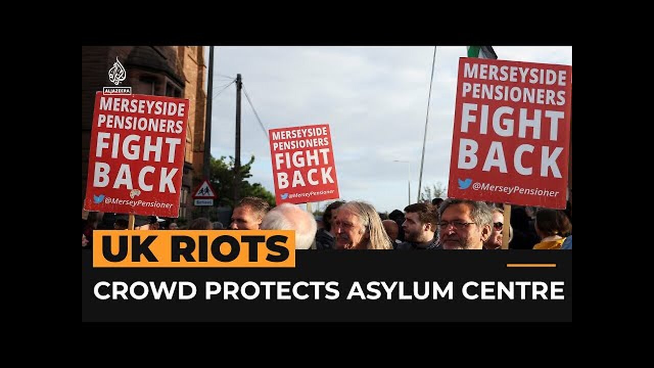 UK anti-racism protesters rally to protect asylum centre