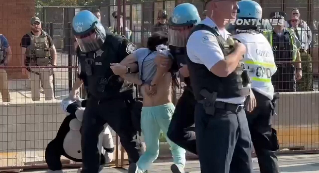 Protesters arrested after breaching a fence with agitators