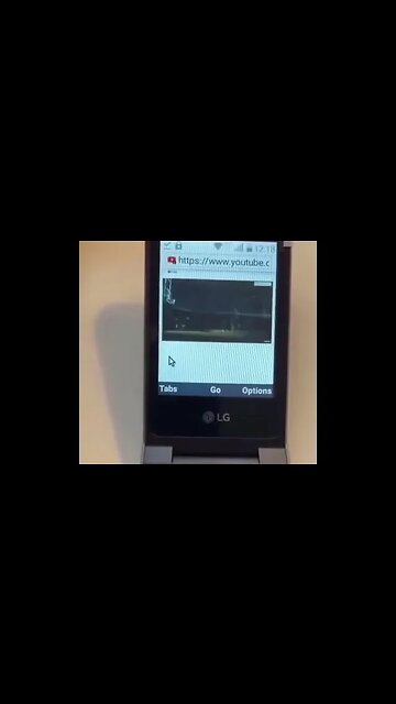 DRAKE WITH HIS FLIP PHONE