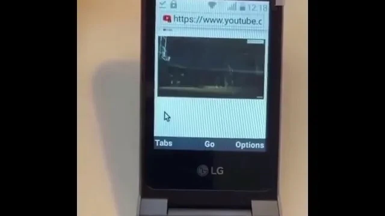 DRAKE WITH HIS FLIP PHONE