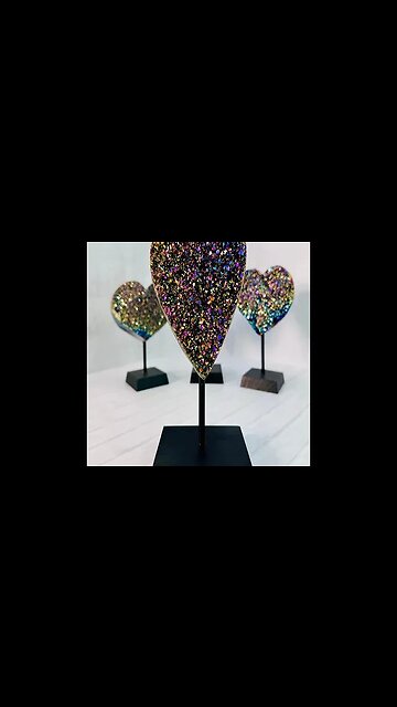 TITANIUM HEART ON WOODEN STAND