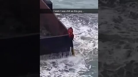 This man is very calm and he even loves the waves in the sea.