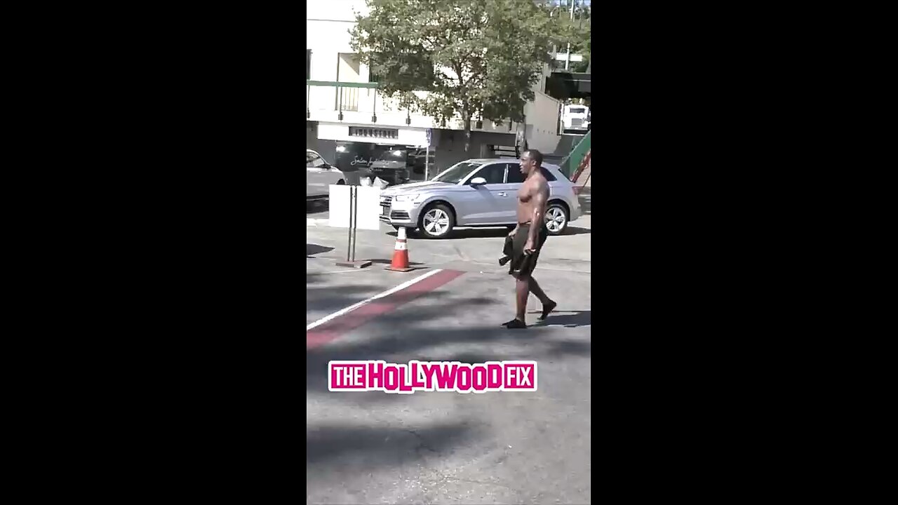 Diddy Gets Upset When Paparazzi Jumps Out On Him