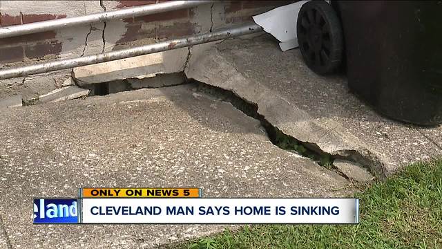 Cleveland man says his home is sinking into the ground