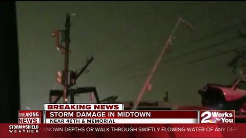 Storm damages car dealership near 46th and Memorial