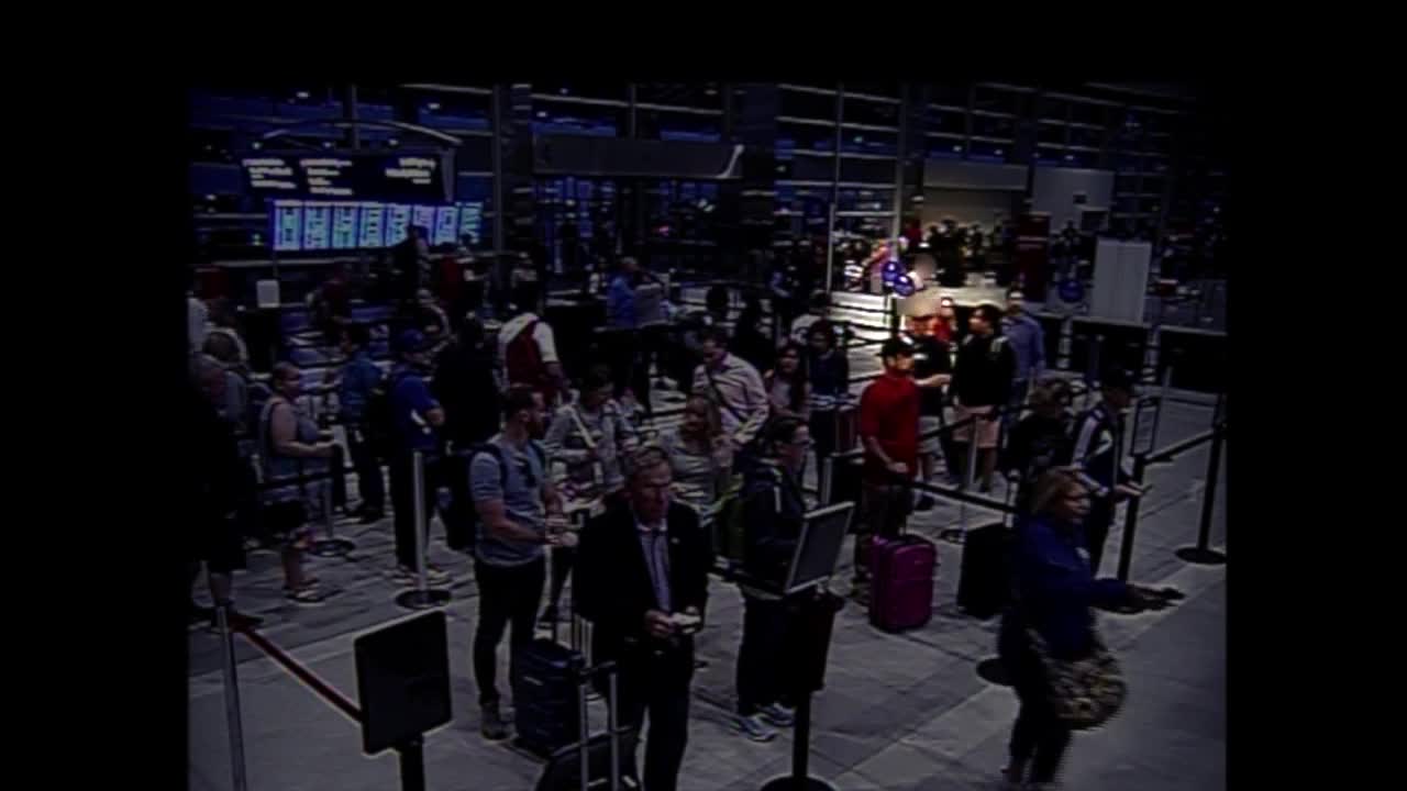 New video shows naked man strip at Detroit Metro Airport and calmly walk past TSA checkpoint