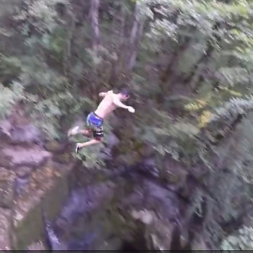 Brave Daredevil Jumps Nearly 50 Feet Into Water Pit