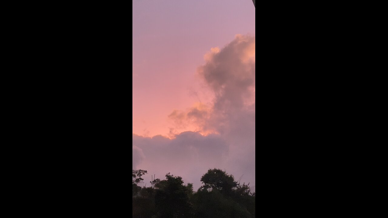 Magical Cloudy Morning with the Moon Peeking Through