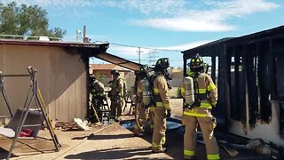 Rural Metro fire crews battle single-wide structure fully engulfed in flames near southside