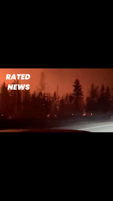 Dramatic Footage of Drive Through Wildfire as Evacuations Sweep Western Canada