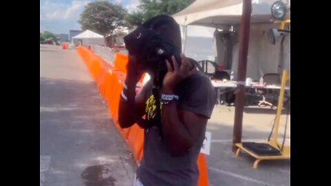 A Haitian man hides his face from my camera. Why?