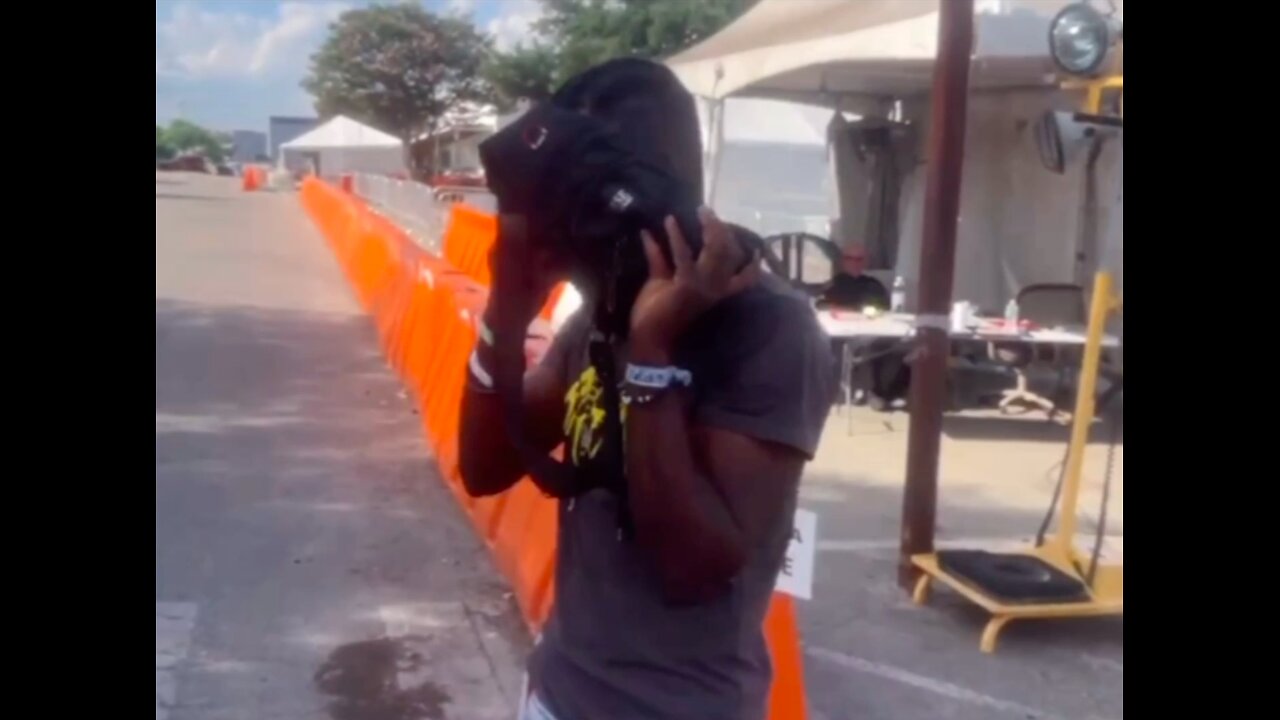 A Haitian man hides his face from my camera. Why?