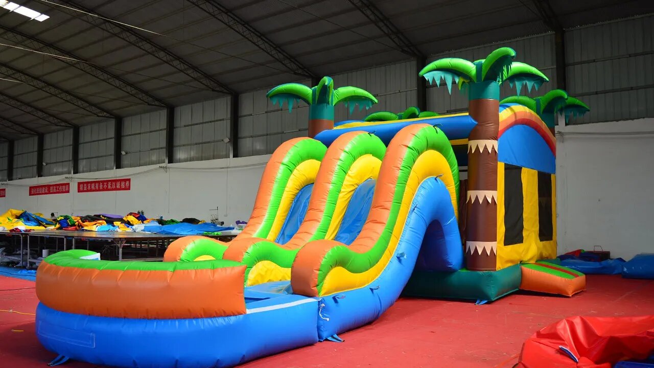 Palm Tree Trampoline With Slide #slide #bouncer #inflatablesupplier #catle #jumping