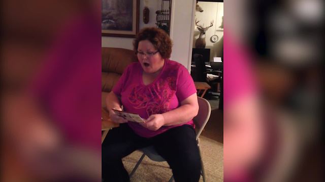 "Women Opens A Christmas Card And Finds Out That She Is Going To Be A Grandmother"