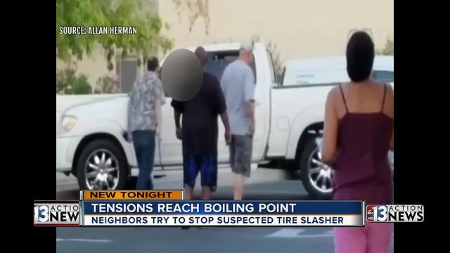 Neighbor try to stop person they believe slashed their tires