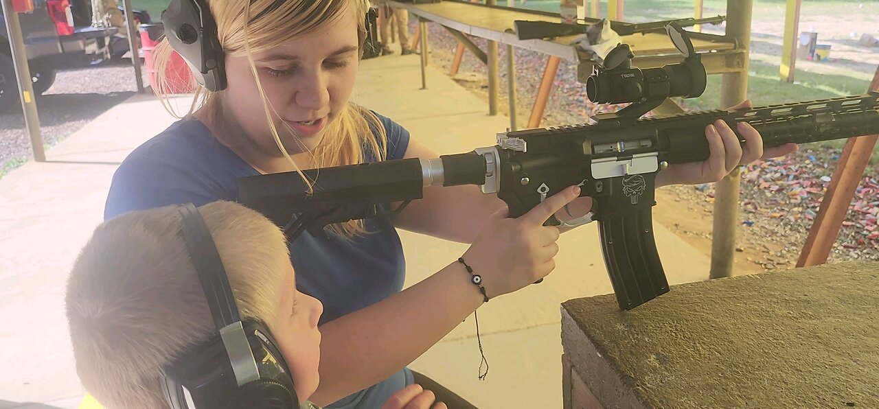 Tori and Emmett with trump 22 ar