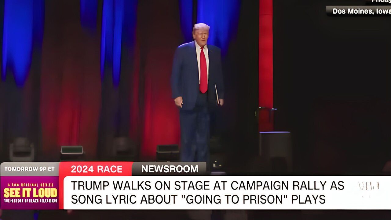 Trump walks onto rally stage as song lyric 'going to prison' plays