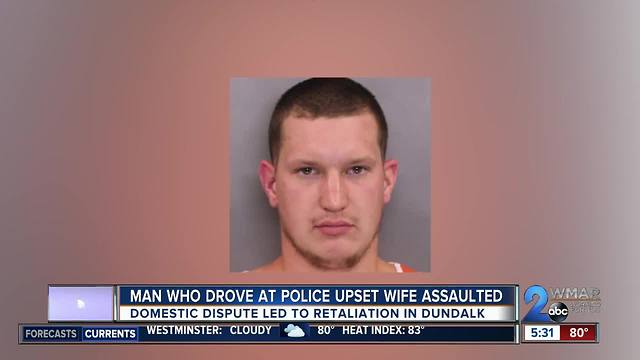 Man who drove at police upset wife assaulted