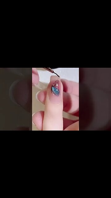 Get ready for some nail art wizardry with NAILGIL's Cat Eye Gel Nail Polish in Jelly Blue! 🌠