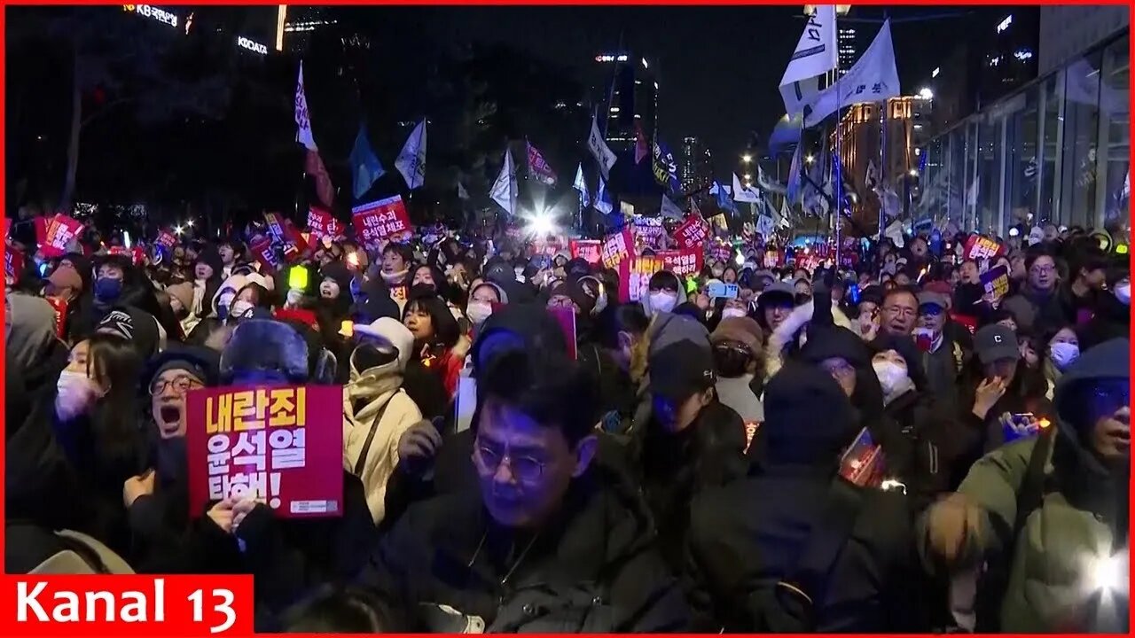 Thousands gather outside the South Korean parliament calling for President Yoon to be impeached