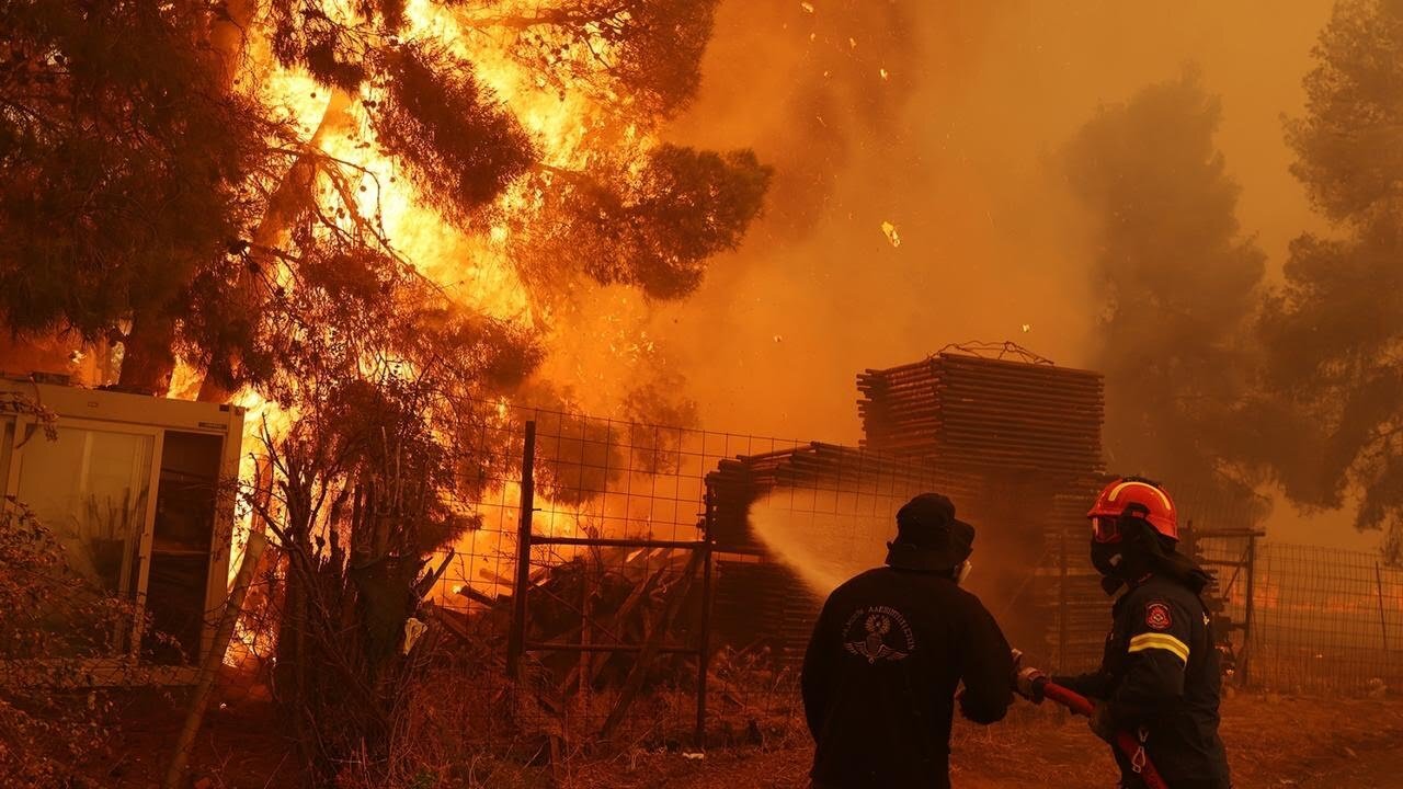 Crews in Greece working to contain deadly wildfires