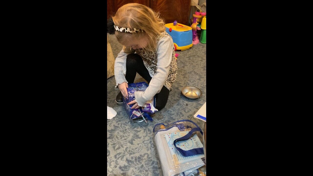 Dassie opening Olaf Jack in the box for Chanukah 🕎