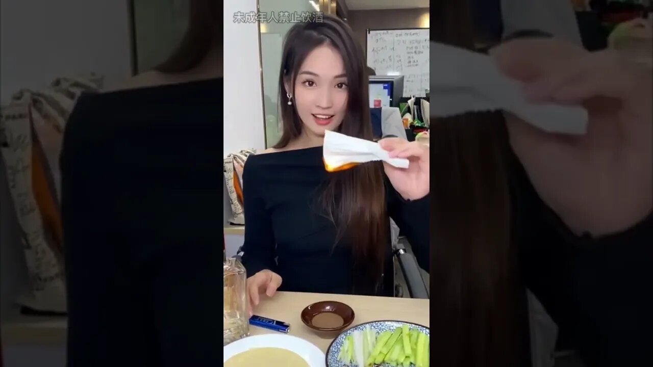 Hot Chinese Girl Has A Small Bowl Of Maotai Baijiu