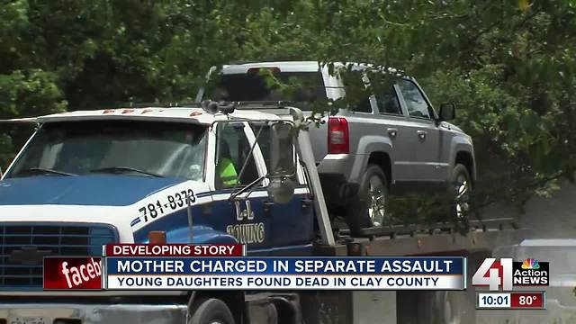 Mom of dead girls charged in previous incident